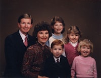 a family posing for a photo